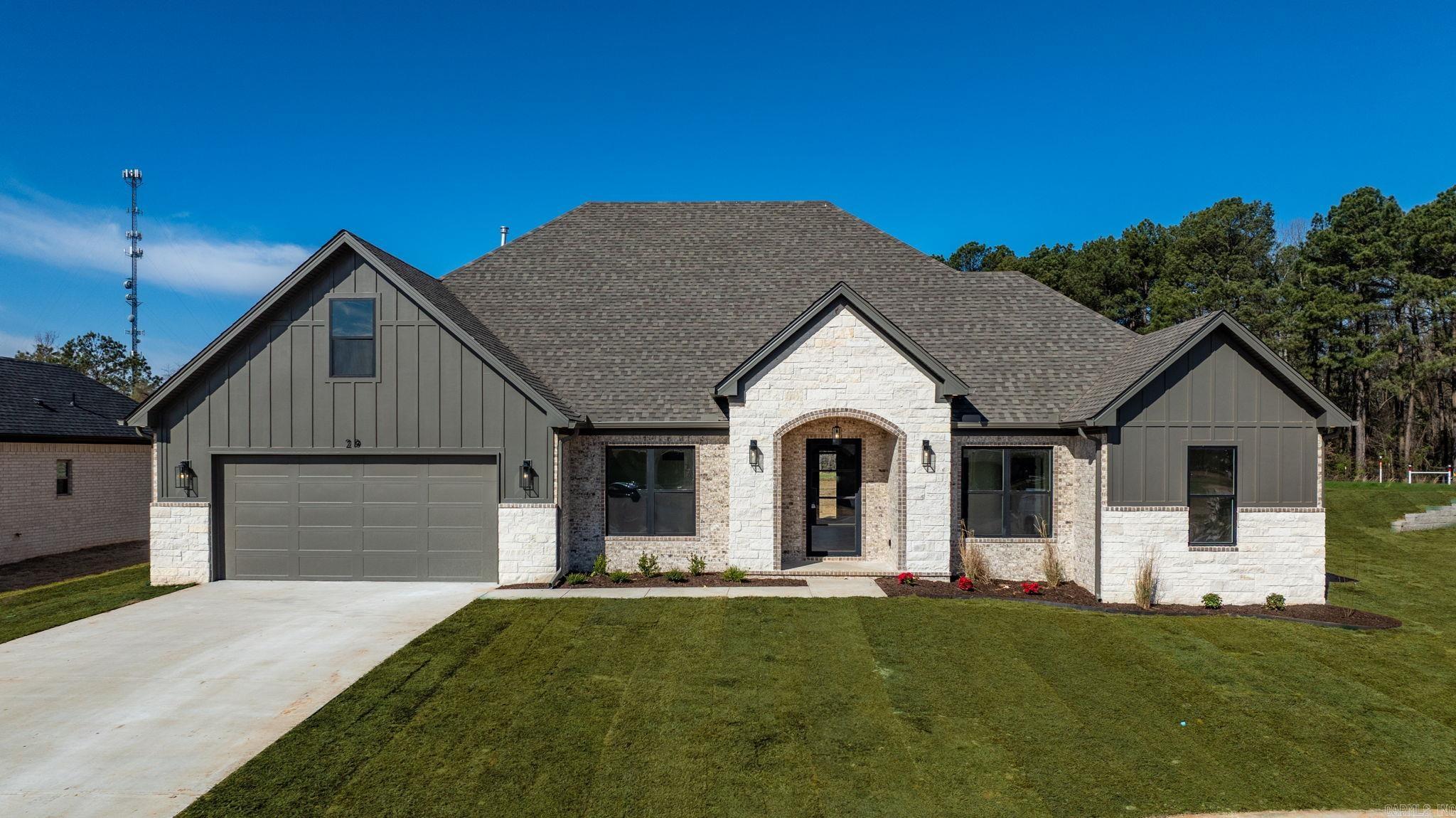 Wanting a custom home without the hassle of the building process?? You found it! Walk in through your custom oversized iron front door into the foyer with a custom floating ceiling. Just off the foyer you find an office/playroom/spare bedroom with custom accent wall and 8' doors. 10' ceilings through living/dining/kitchen features custom cabinets in the kitchen all the way to the ceiling, backsplash to the ceiling above your farm sink that over looks the back yard and HUGE back porch. Brick columns and fireplace as well. Custom white oak beams, cabinets, island and shelving that perfectly compliments the Next Gen water resistant floating hardwood floors. Under counter lighting in the remarkable kitchen, with SOFT CLOSE hinges throughout the entire home. Hidden pantry is HUGE! Primary suite features custom beams, double vanities, custom tiled shower, soaker tub, huge closet with built in that connects to large laundry with more custom cabinetry. Head up the custom white oak stair treads to the bonus room with a large walk in closet for optimal use! Tankless WH, oversized gas range, FP and gas heat. Exterior features custom stone and board and batten hardy. + a HUGE fenced back yard!