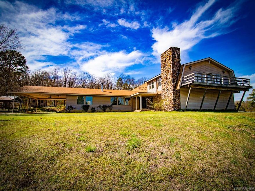 Located just outside the city limits of Little Rock, this 20.27 acres is ideal for those seeking a peaceful countryside lifestyle without compromising on functionality and conveinence. Just minutes from lake Maumelle.  Has a few bay stall with pasture and 30x60 red iron building.  This home really has a lot to offer at 4,803 sqft. With 5 spacious bedrooms and 5 full bathrooms, there's plenty of room for family and guests. The addition of a study and an office is perfect for those who work from home or need a quiet space to focus.  The formal dining room provides an elegant setting for gathersoft and dinner parties, while the open concept kitchen and living room create a warm and inviting atmosphere.This layout not only enhances the flow of natural light but also allows for easy interaction between family and friends.  Please see agent remarks Motivated Sellers!
