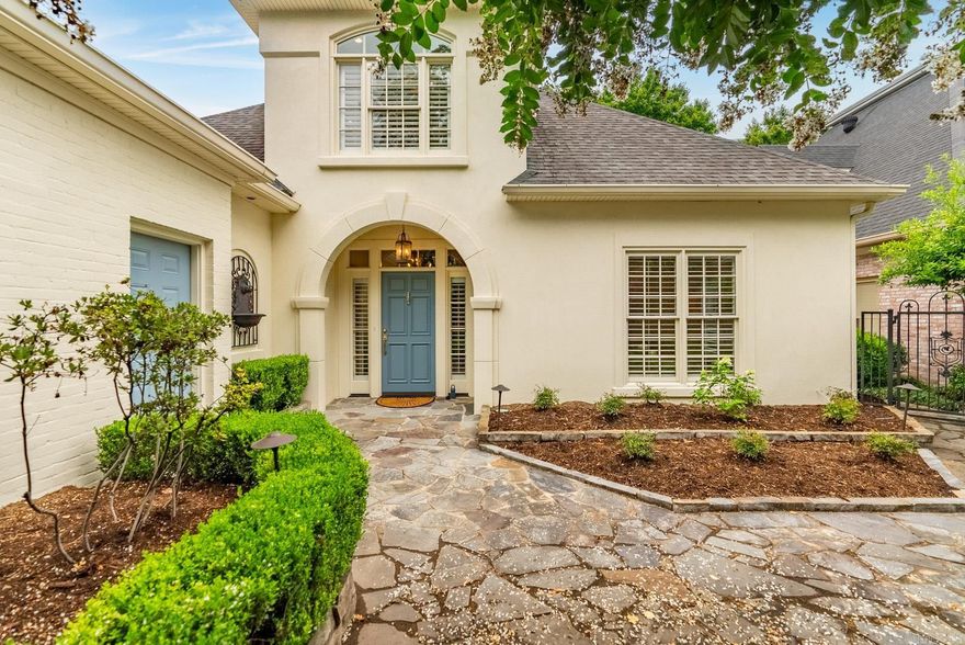 Fantastic layout in the gated Canal Pointe area. Beautiful street presence with gorgeous gated courtyard. Formal spaces flank the entry hall. Both dining and living room have canned lighting and beautiful hardwoods. The primary bedroom is on the main level with a large walk-in closet as well as two other closets.  Small sitting or office space right off the bedroom. Large primary bath with double vanity, tub and shower, plus more storage space. Wonderfully large open, kitchen /den area with gas log fireplace. Laundry on main level near the entrance to the two car garage.   Upstairs are tow more bedrooms, an updated bathroom and landing that leads to a patio overlooking the canal.  Covered patio off of the primary bedroom and family room with privacy.   Lovely landscape lighting at night.  House has been completely repainted the hardwoods are brand new.  One HVAC unit is less than a month old!   New oven, warming drawer, dishwasher, ice maker and microwave.