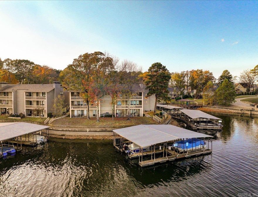 Welcome to the highly sought after Moorings Complex on the shores of Lake Hamilton! This unit is walk-in level with panoramic views of the mountains and Lake Hamilton. Conveniently located off 7 South you are just a few minutes away from all Hot Springs has to offer! Spend your days soaking up the sun on the Lake and your evenings gaming it up at Oaklawn! Recent updates include new kitchen appliances, new kitchen sink, new full size washer and dryer, electric blinds throughout, totally remodeled bathrooms, new HVAC and all new windows and doors scheduled for installation mid December 2025! Selling furnished! Ranger Boat and HydroHoist lift not included in purchase price, but are negotiable.