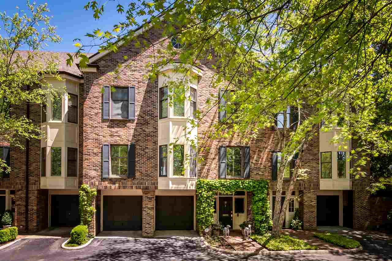 Updated Riverbend Townhouse. The foyer leads to a guest suite and wonderful spiral staircase. The main level features a lg. LR with fireplace overlooking a beautiful rock patio and sweeping view of the river. Oversized DR with lg. closet for china and silver storage. Updated kitchen and informal dining area. The upper floor houses the master suite with fireplace, 2 renovated baths and lg. closet. Additional guest suite. The two-car garage is side by side and offers custom built in's for additional storage.