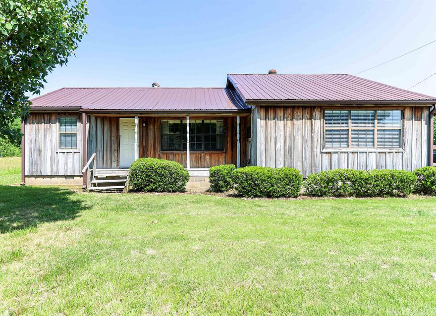 Looking for a cabin style home with updates? This home sits on one acres of land, three bedrooms, split floor plan, dining area and breakfast area, the new Kitchen cabinets and countertops are a plus, the large screened deck is 10x30. There is new lvp flooring throughout and seller will provide a termite contract. If living here is not your preference maybe your business might be a great option with high visibility and room to expand!