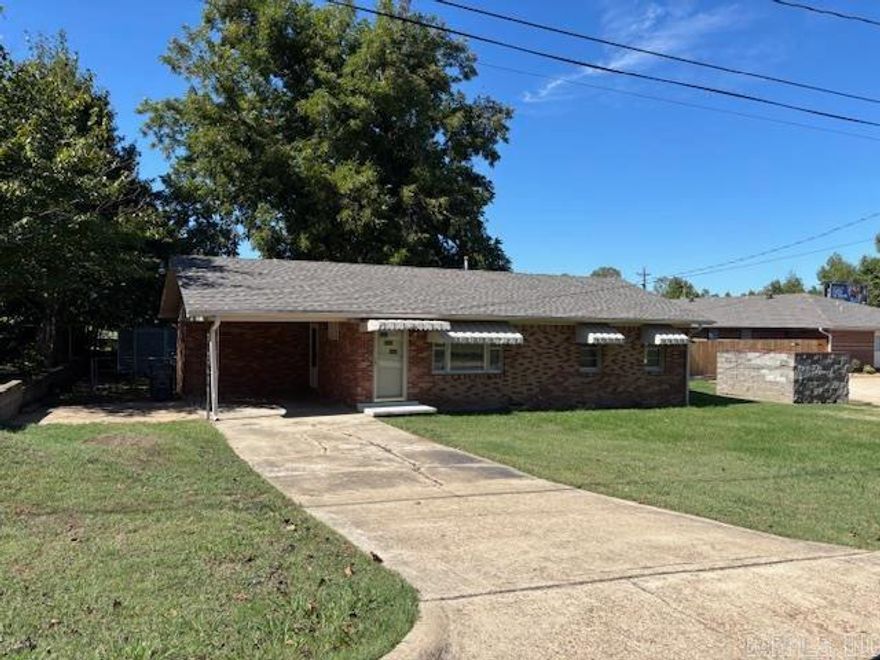 Attractive all brick 2 bed/1 bath home with new paint, new vinyl plank flooring, new shingled roof. Fenced back lawn with storage building.  Convenient location to ASU and other services.