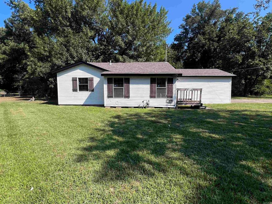 Check out this 2BR/1BA home located outside the city limits, with newer floors and updated kitchen. Situated on almost 3/4 an acre! Property is bank owned - no disclosures are available. Call today to schedule your appointment to see this one!