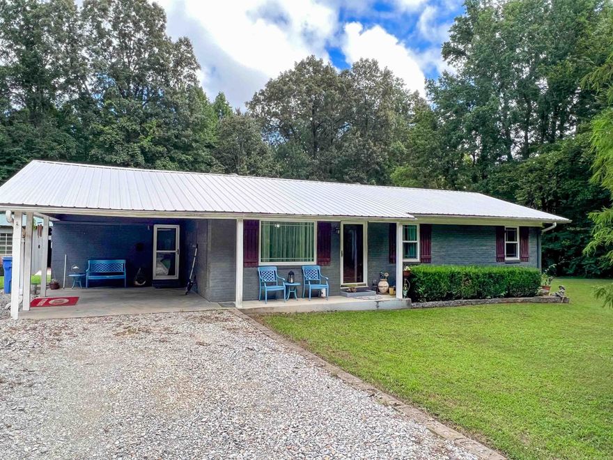 Welcome to your perfect retreat in Greene County, AR, just minutes from Paragould and nestled by the charming Oak Grove Heights community. This exceptional all-brick home boasts modern comfort and style. With a newer central HVAC unit, new windows, and recent interior updates, it offers a move-in-ready haven. Embrace the serenity of approximately 0.72 acres, enveloped by shade trees and frequented by abundant wildlife. Step inside to discover a cozy haven with a spacious kitchen, complete with sliding glass doors opening to a delightful deck – perfect for outdoor living. Covered parking via a one-car carport, a generous workshop, and an additional storage building ensure convenience and space. Eligible for 100% Rural Development financing, this is an opportunity you won't want to miss, capturing both tranquility and modern living.