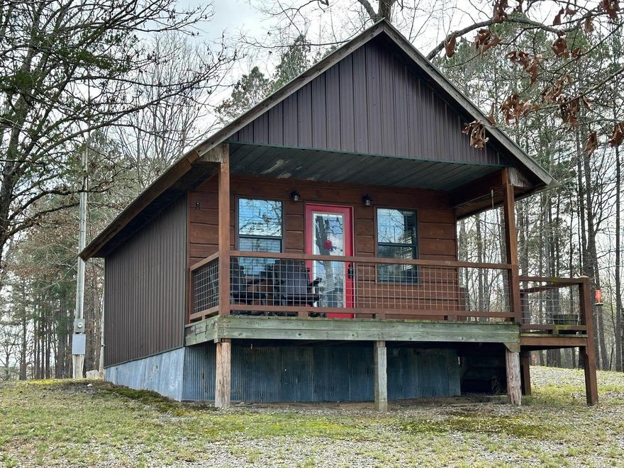 AMAZING OPPORTUNITY to own a RIVER FRONT Cabin on the MOUNTAIN FORK RIVER!  Completely Remodeled and FURNISHED this studio cabin is MOVE IN READY!! You can see and hear the River from your Front Porch!  There is a common area that allows you access to the river for fishing, swimming, kayaking, and canoeing!  Another common area for extra parking. This is a DREAM location!  Agents see remarks.