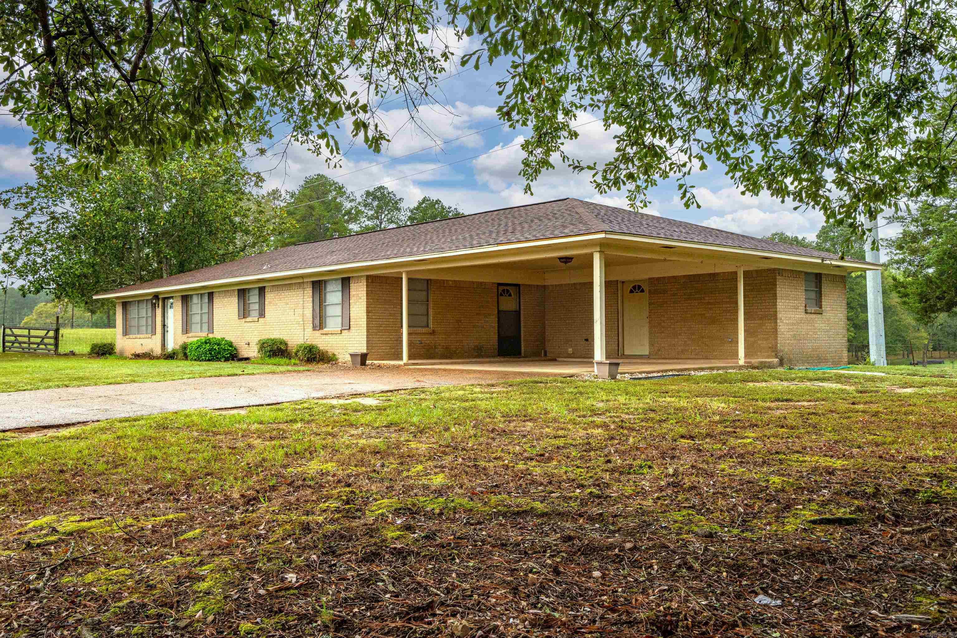 Welcome Home To This Brick Rambler With Updates .New Heat And Air ,3 Bedrooms,2 Baths, Large Den/Kitchen,Double Carport With Utility In Back And Door To Den Also.New Roof Not Even A Year Old. Property Has A Large Fertile Garden Spot Fenced On The West Side Of The Home . There Is A Barn And Pond Out Back This Portion Is approx. 7.34 Acres.Then Open Gate That Goes Into The 88 Acre Parcel With 4 Ponds ,Land That You Could Run Cattle ,Livestock On Or Subdivide Into Parcels To Sell For Building. The 88 Acres Has A Road Acces To Large Gravel Bar To Enjoy Fishing Off The Gravel Bar .Camping,Picnic,Kayaking,Canoeing,Bonfire,Just Endless Possiblities With This One. If you decide you want to put the bigger boat in,well,just acoss Calvin Rd theres a boatramp for your convenience to go right into Lake Degray or Left in Caddo River backwater...Either way,it's a Win,Win situation! 95.34 Acres With Home,Barn,Pond,Acces To Caddo River And Lake Degray.! BY Appointment Only!