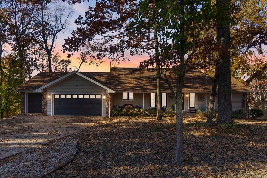 Welcome to your Dream Lake Home with a private boat dock, boardwalk, and hillside lift on Loch Lomond! Available FULLY furnished/turn-key, if desired, this home is perfect for a primary home, a vacation home, or VRBO/Airbnb! With a boat launch nearby, and located just steps from Lake Bella Vista Park and the Razorback greenway, this home offers unbeatable access to Northwest Arkansas’s premier outdoor amenities. Inside, you’ll find a bright and inviting living room that seamlessly connects to a spacious kitchen featuring custom cabinets and generous counter space.  The primary suite is complete with a deep soaking tub, walk-in shower, and dual vanities. The lower level adds flexibility with two additional rooms that can serve as bedrooms, home offices, or creative spaces, along with a second living area designed for entertainment or quiet downtime.  Modern conveniences include a Tesla charger, while the surrounding outdoor space is a dream for nature lovers. Whether you're enjoying lakeside strolls,  or simply taking in the scenic lake views, this home blends comfort, convenience, and a strong connection to nature—perfect for both adventurers and those seeking the dream lake life!