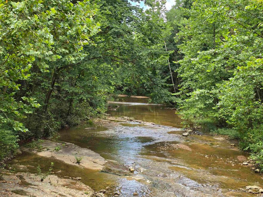 Welcome to the market this 14 +/- Acres on the beautiful Mill Creek in Sharp County, Arkansas! In the little community of Poughkeepsie, is this ideal 14 +/- wooded acres which is unrestricted and could be used for your new home on Mill Creek or just about anything else you would want! This property features around 275' of creek frontage and could be an excellent homeplace or homestead!