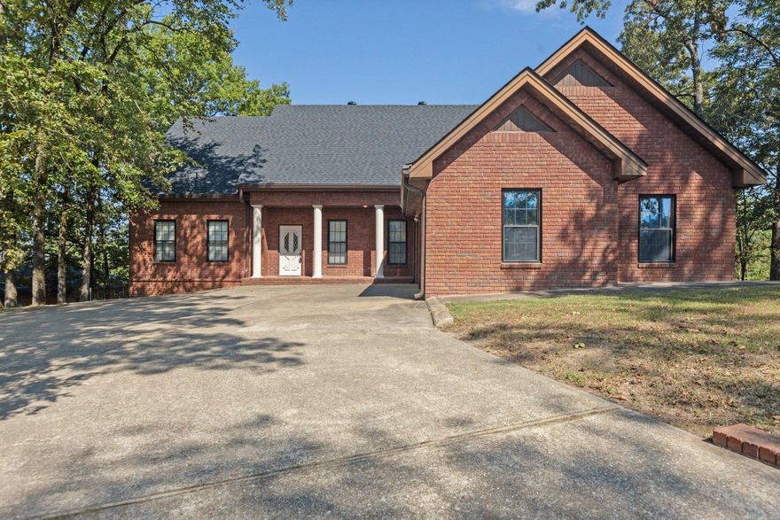 Discover your oasis at this stunning lakefront property nestled on the shores of Lake Hamilton. Prime lakefront property with 170 ft of shore line on sought after Summertime Point. Come enjoy breathtaking views of the lake from multiple vantage points. This spacious 4 bedrooms and 3 and 1/2 bathrooms home is unique all the down to its red iron and metal framing. Features: 1.41 acre lot, covered boat dock (coming soon), new roof, newer mechanical items such as HVAC and water heater, vaulted ceilings, and open floor plan. Step into a world of comfort and relaxation with this meticulously maintained 4164 sqft red iron and metal frame built dream home, that sits on almost a half acre of lake front property. Whether you're enjoying morning coffee while looking out at the water, fishing from your private boat dock, or entertaining guests in the expansive living areas, this home offers the perfect blend of space and charm. Location: Situated in Hot Springs, known for its natural hot springs, and vibrant community, 212 Summertime Point provides easy access to the lake, dining, casino, race track, shopping and much much more. Call today for your VIP showing!