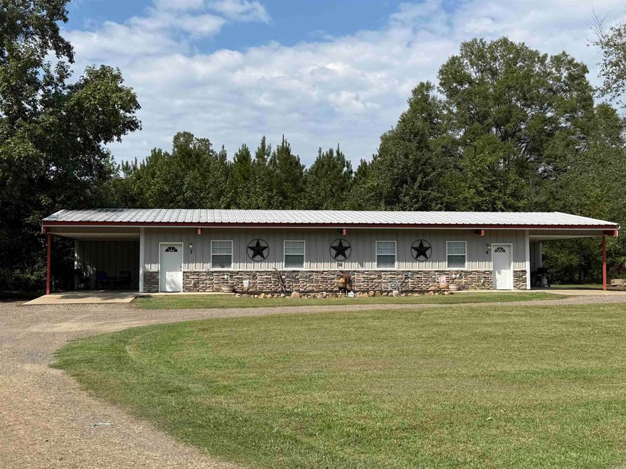 Minutes from the Crater of Diamond State Park and beautiful Lake Greeson, this Vacation Rental Opportunity - "Creekside" Air-B-n-B is the perfect turn key investment, with room for expansion.  "Creekside" has great 4.99 rating reviews and current reserved dates which will transfer to the new owner. Property offers a duplex with 2 separate rentals - each unit offers 2 bedrooms and 1 full bath, fully functional kitchen with lots of cabinet space, all appliances and entire kitchen supplies to convey, spacious living/dining completely furnished with all the decor, laundry closet with washer and dryer to convey.  Situated on approx 2.4 acres of high traffic highway frontage land, city water, city sewer, owner has drawing and lay out for additional growth for this investment opportunity.  Duplex is handicapped accessible, with options where new owner could occupy one side with the other producing rental income.  Contact our office for  more details.