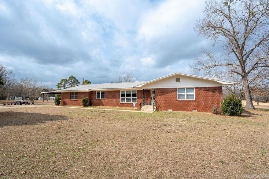 Well-maintained 3 bedroom, 2 bath home offering 2,364 sq ft on 4.82 acres along Hwy 25 on the east side of Quitman. This versatile property offers excellent highway frontage and plenty of room for a small farm and/or potential use for a commercial business. The move-in ready home has been well cared for and features numerous updates including vinyl windows, LED can lighting, updated toilets, and added 12" insulation for efficiency, as well as a metal roof. Major improvements include new interior paint, LVP flooring and a new HVAC system installed in 2024. Inside you’ll find an additional living/den area and a flexible bonus room that could serve as an office or 4th bedroom. With fiber optic internet available and room to grow, this property offers the perfect blend of comfort, convenience, and opportunity just minutes from Quitman and within 15 minutes of Cove Creek Rec Area on Greers Ferry Lake.
