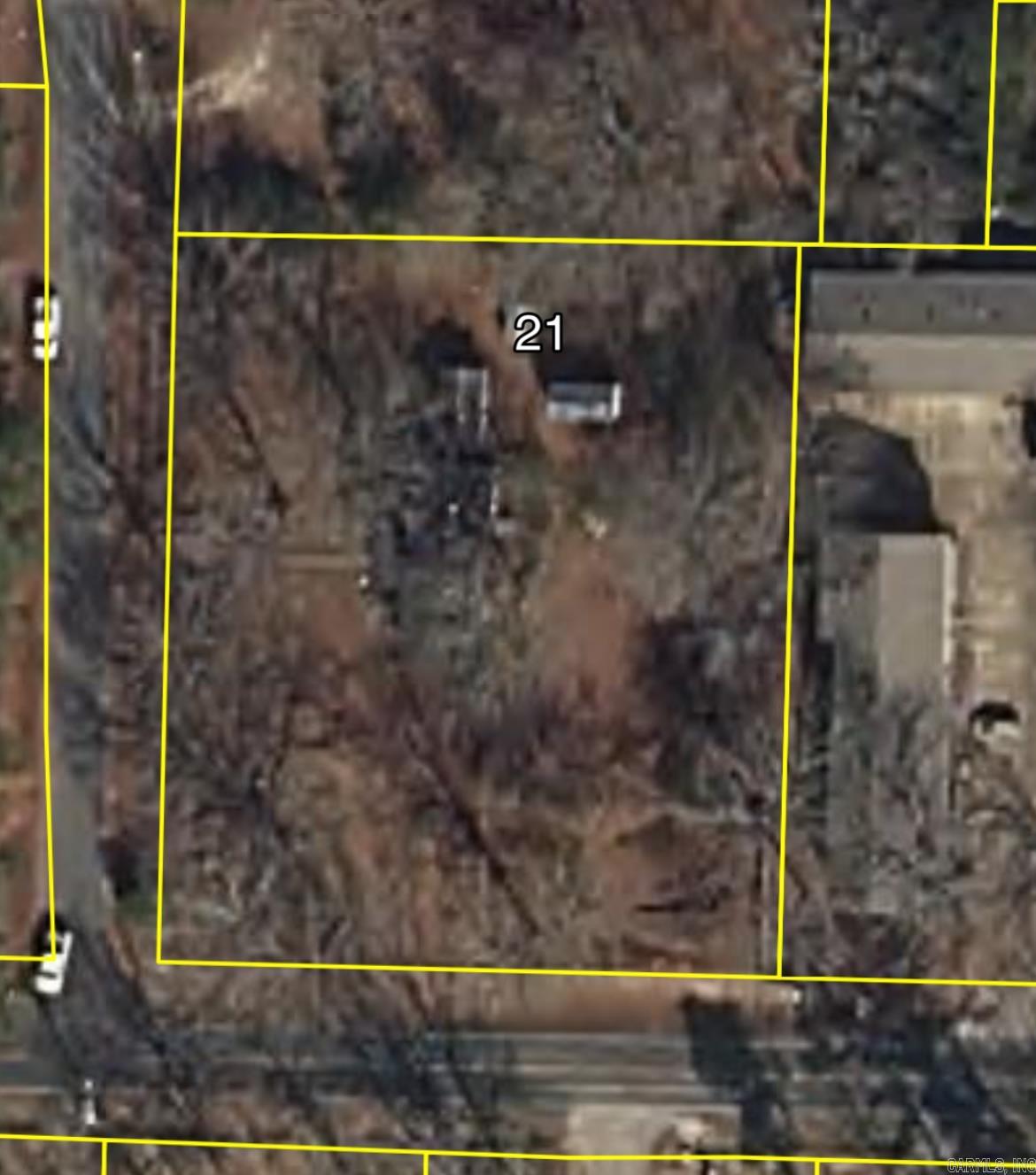 1.2 acres on the corner of Jacksonville Cutoff and Gibson is a great location to build your new home or a great opportunity for an investor to have it rezoned for multifamily residences, duplexes, triplexes, apartments, etc. Water, electric, and sewer hook ups all already here! No mobile homes allowed. The house and buildings are NOT to be entered for safety reasons.