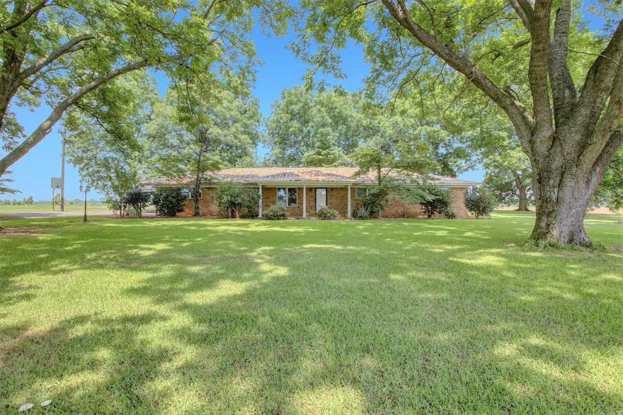 Welcome to this stunning property nestled on a spacious 1.49-acre lot. This large and roomy home offers a comfortable and inviting living experience with its three bedrooms and two bathrooms, and an additional bathroom in the shop. As you step inside, you'll be greeted by a generous kitchen that seamlessly flows into the den area. Imagine enjoying your morning coffee while gazing out through the glass patio door, which provides a picturesque view of the lush pecan and fruit trees that adorn the property. One of the standout features of this property is the shop, which not only provides ample storage space but also boasts a full you have a hobby that requires a workshop or simply need extra space for your vehicles, this shop is a valuable addition. Situated just minutes away from the popular Saracen Casino Resort, this property offers the best of both worlds. With its beautiful trees and meticulously landscaped surroundings, it creates a serene oasis in the midst of farm country. However, its proximity to downtown amenities ensures that you're never too far away from shopping, dining, and entertainment options. Don't miss the opportunity to own this remarkable home!