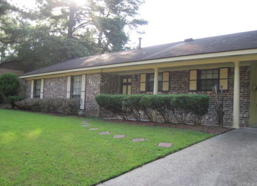 Charming brick home featuring 3 bedrooms and 2 baths with a large backyard.