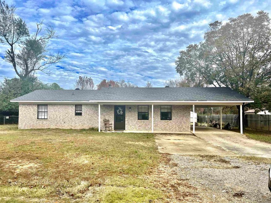 This property offers a comfortable and inviting living space for those seeking a cozy and well-maintained home. As you step inside, you'll immediately notice the open floor plan, which creates a seamless flow throughout the house. The new floors add a touch of modern to the space, while the fresh paint throughout gives it a bright and clean atmosphere. New roof in 2017. New hot water heater in 2016. The half-acre fully fenced lot provides ample space for outdoor activities and entertainment. For those who enjoy tinkering or need extra storage space, there is a small shop in the backyard equipped with electricity. This can be used as a workshop, hobby room, or simply as additional storage for your belongings. Convenient access to local amenities and attractions as well.  Agents please see remarks.