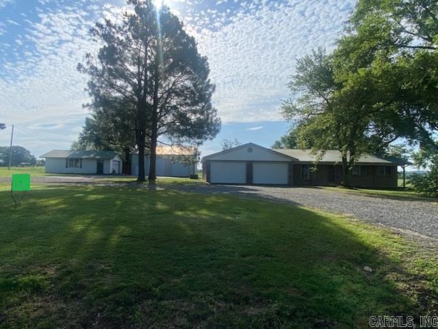 UPDATED HOME. LARGE TREE COVERED LOT SHADES HOUSE MOST OF THE DAY, WHICH KEEPS THE AC FROM WORKING OVERTIME. COUNTRY LIVING AT ITS FINEST. ENJOY PANORAMIC VIEWS OF PASTURES AND SOME COWS. MASTER BEDROOM HAS A HALF BATH, PLUS 2 FULL BATHS, ONE WITH WAKIN SHOWER. HUGE WALKIN CLOSET NEAR THE GARAGE, 2 PANTRY AREAS, OVERSIZED ATTACHED GARAGE 23X29 HEATED AND COOLED IF YOU LIKE, 2 SHOPS, ONE IS 24X32 FOR STORAGE AND ONE IS 40X55 WITH 2 12FT DOORS, INSULATED HEATED AND COOLED FOR YEAR ROUND PRODUCTIVITY. COVERED BACK PORCH FACES EAST FOR SHADED AFTERNOONS. ENJOY THE DRIVE OUT AND TAKE A LOOK AT THE PRIVACY AND THIS BEAUTIFUL COUNTRY SIDE. 184 BLACKFORK ROAD, GREENBRIER, ARKANSAS 72058.