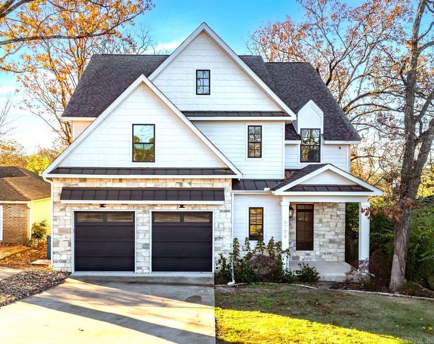 Spectacular newer construction in Cammack Village!  Fantastic family floor plan with numerous amenities and beautiful modern decor. Gorgeous entry into open, light filled living space. Large dining area. Outstanding gourmet kitchen with island. Spacious family living room with fireplace and access to fabulous outdoor terrace. Sep home office or downstairs playroom and half bath. Upstairs: Luxurious master suite with spa inspired bath. 3 additional large guest bedrooms with 2 full baths. 2 car garage. Privacy fenced back yard. Outstanding home for family living and entertaining friends. Easy walk to Baker Park and Jefferson!