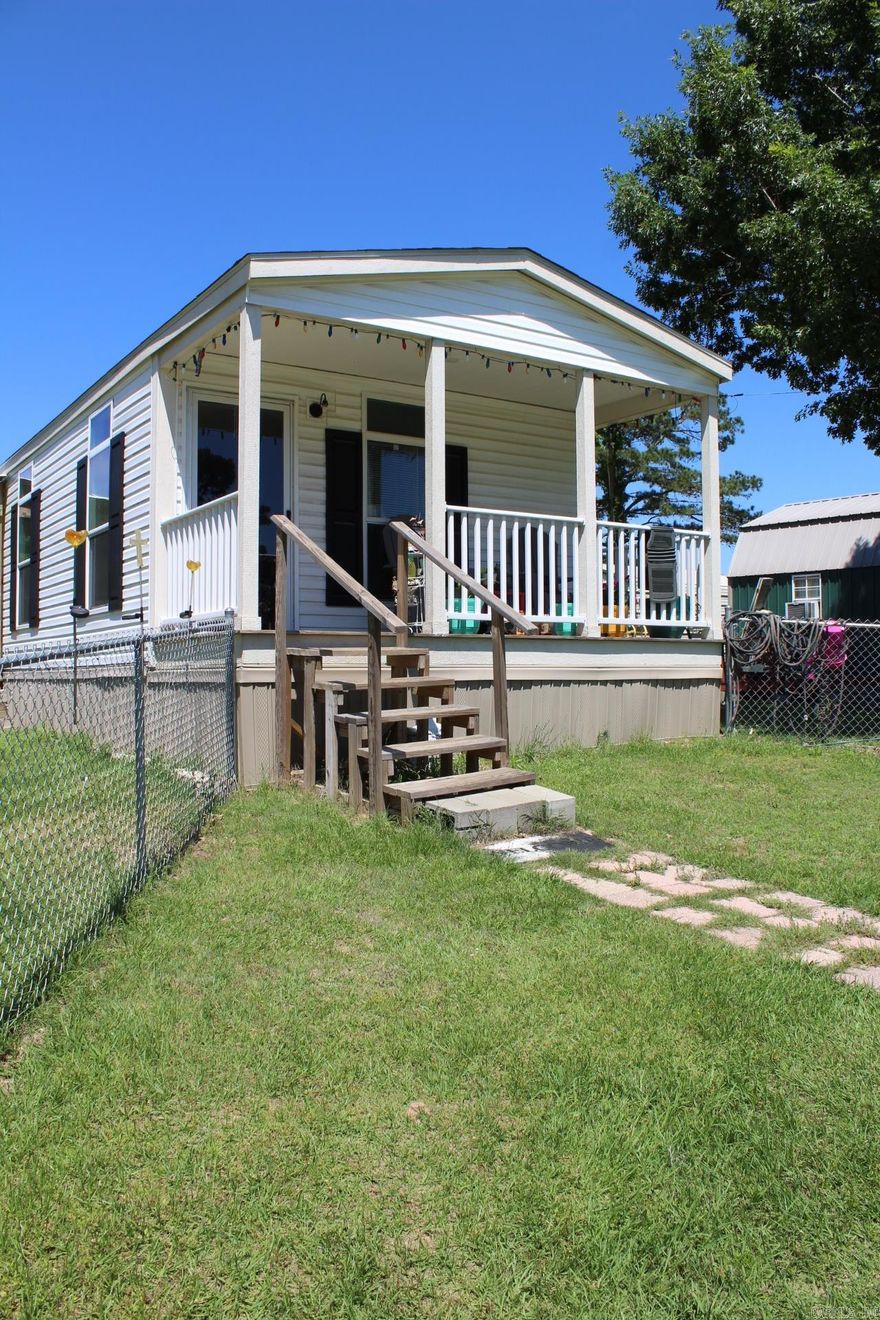 1 Bedroom, 1 Full Bath with approx. 576 Sq. Ft. of living space.  Kitchen has range, dishwasher and refrigerator that conveys with sell of home.   Home has laundry area. Home is on approx. a acre lot and has a deck.  Property has several outbuildings.