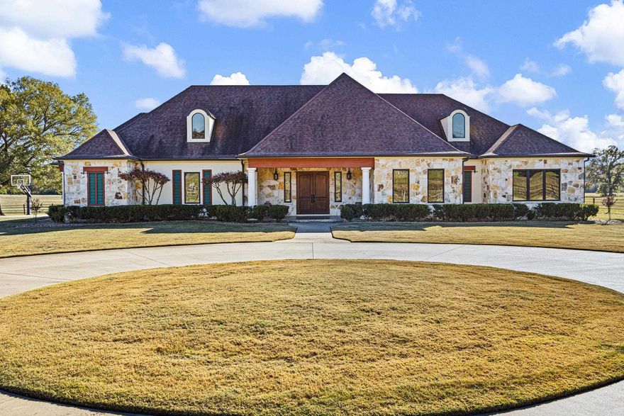 Discover unmatched privacy, space, and custom craftsmanship in this exceptional estate home set on approximately 69.5 acres right on the edge of town.  Designed with both comfort and elegance in mind, the home features expansive living areas, custom finishes, and thoughtful design throughout. The main floor features an open custom kitchen to living space with fireplace. Upstairs features open flexible, game or second living complete with 1/2 bath.  Step outside and enjoy resort-style living with a sparkling in-ground pool, perfect for entertaining or relaxing in total privacy. The acreage includes multiple ponds, and rolling fields—ideal for recreation, livestock, or simply taking in the peaceful surroundings. A rare find complete with a detached shop with extended overhangs, a barn, and ample room for equipment, hobbies, or animals. This is more than a home—it’s an estate designed for lifestyle, comfort, and legacy.