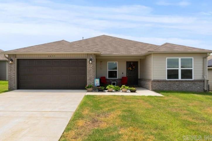 Rural Development Loan eligible area! Motivated seller! Beautiful 4 bedroom 2 bath home built in 2023. LIKE NEW! Luxury vinyl floors throughout - no carpet. Great oversized living room with high ceilings and open to kitchen with dining area. HUGE primary bedroom. Primary bath has large walk in closet. 3 additional bedrooms on opposite side of the home with additional full bath. Lots of closet space. Backyard backs up to green space. Seller has added fans in bedrooms and living room, 2" blinds throughout, gutters on front of home, upgraded shower heads, additional landscaping, painted garage, and more! Agents see remarks.