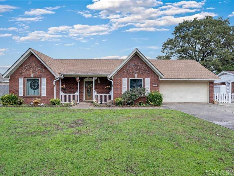 Welcome to 110 Flossie Drive, a beautifully laid-out 3-bedroom, 2-bath home offering over 2,000 square feet of comfortable living space. Step into an inviting main living area, featuring a large picture window that looks out onto the peaceful backyard that is perfect for birdwatching or just enjoying the view. You'll love the enclosed back patio, ideal for morning coffee or relaxing evenings, no matter the weather. The functional layout offers great flow throughout, with generous room sizes and plenty of natural light. Recent updates include a new roof, new HVAC, and new water heater, giving you peace of mind and energy efficiency. The 2-car garage provides plenty of space for parking and storage.