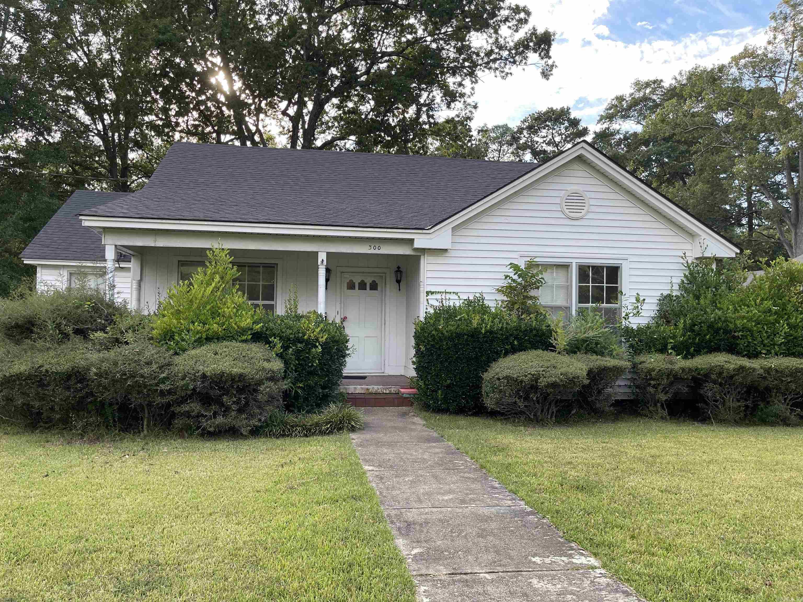 Well built older home with charm and character. Large corner lot. Beautiful hardwood floors, oak cabinets with pull-out shelves. Storage Buildings in the back.
