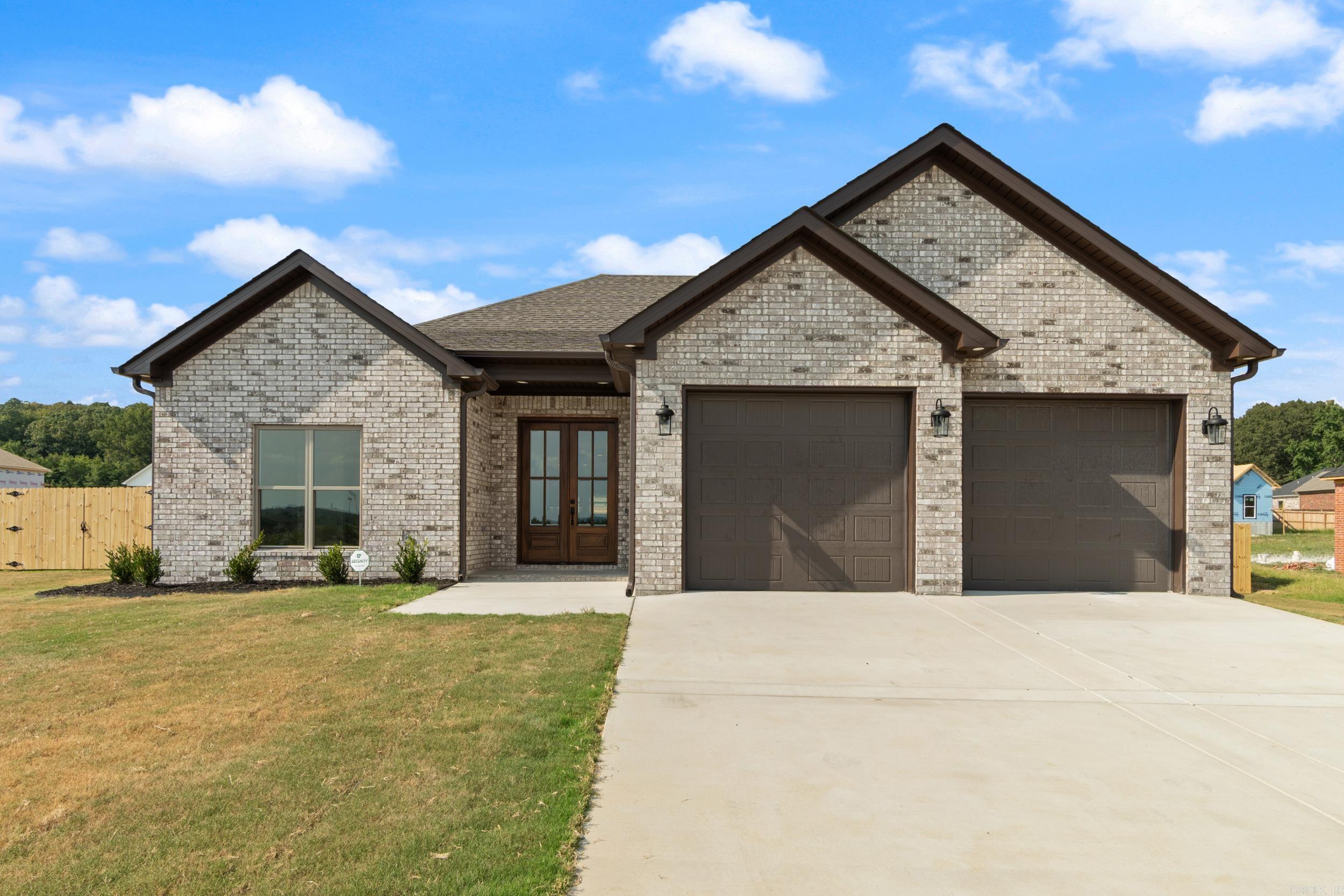 Gorgeous new construction in Vilonia's Ridge View neighborhood with a fully fenced back yard. Brilliant open concept floor plan with tons of extras throughout. This home is perfect for entertaining and spending time with family and friends. You can be in the kitchen and still interact with family and guests in the dining and living areas. Beautiful quartz countertops, large kitchen island, custom backsplash, and an oversized walk-in pantry you just have to see! Split floor plan. The primary suite features a large custom tile shower, two sinks, and a walk-in closet. The huge laundry room has tons of cabinets and a quartz countertop for folding clothes. Just inside the entry from the garage is a mudroom with custom locker cabinet. Tankless water heater. Outside, you'll find a covered patio with ceiling fan that's perfect for enjoying your morning coffee. Finding a new construction home with a fully fenced backyard already in place is rare! Great location with easy access to Conway and the Little Rock Air Force Base. Schedule your private showing today. Annual tax amount listed is based on vacant lot. Actual taxes will be higher, but the amount is unknown at this time.