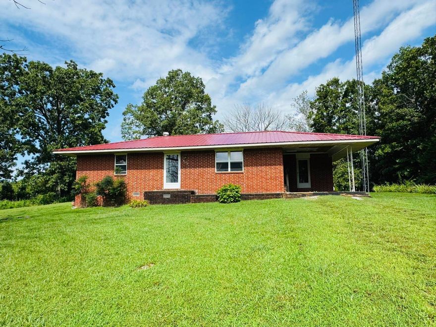 2 bed, 1 bath brick home on 2.5 acres outside of Salem, AR. This property offers an open floor plan layout with some updates throughout! The home has a new roof! Enjoy the convenience of a spacious 32x40 shop—perfect for hobbies, storage, or a small business. There is also an old home, that could be restored, or torn down to have a larger yard. Concrete slab near shop with electric, water, & septic hookup.  The land provides plenty of room for gardening, pets, or future expansion. Endless possibilities at an affordable price!
