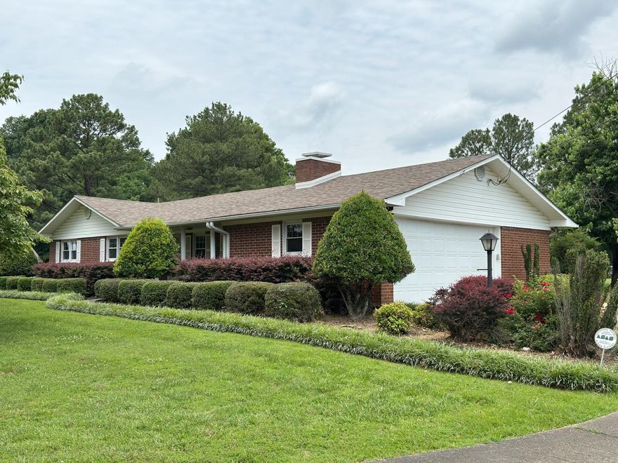 Beautifully maintained 3-bedroom, 2-bath brick ranch style home situated on 1.29± acres in Jonesboro. This single-level residence offers an open floor plan with spacious living areas and a cozy fireplace. Features include central heat and air, wood flooring, an attached 2-car garage, and multiple outbuildings for added storage or workspace. Conveniently located just minutes from shopping, schools, and Arkansas State University, this property combines comfort and convenience with plenty of room to grow. A rare opportunity to own a home with a large lot in a desirable area!