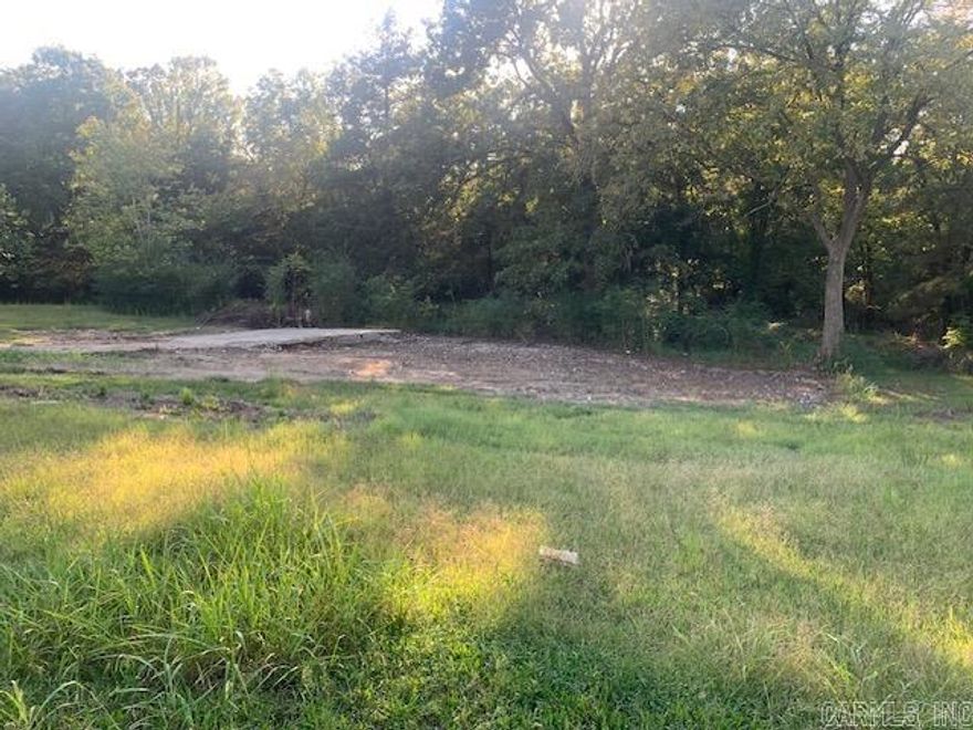 3 lots, level, paved road and all utilities. One lot is wooded and 2 have been cleared of a homeplace and ready for you to rebuild your own home. Property is located in town, just minutes to White River.