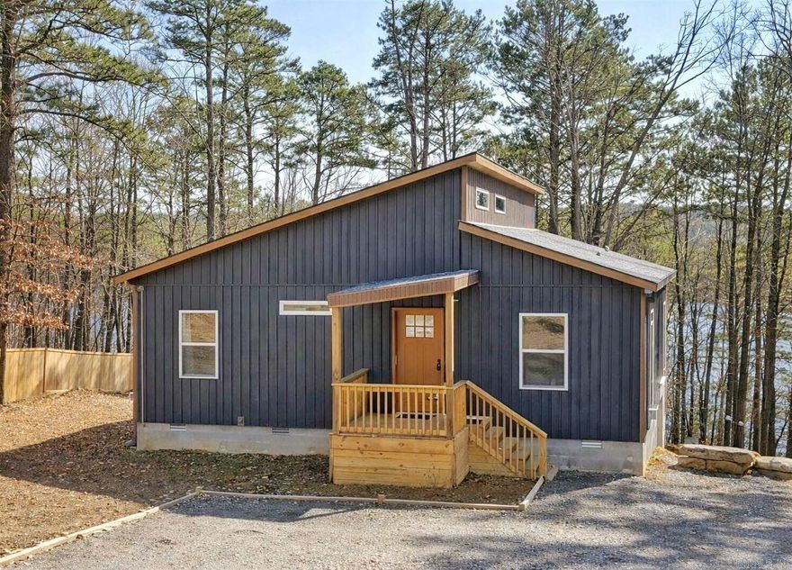 This unique property features a fully furnished cabin on a spacious lot. The cabin offers 3 bedrooms, 2 baths, a loft , an open living area with a fireplace, and a full kitchen.  Enjoy landscaped grounds, a fire pit, and peaceful surroundings—all just minutes from local amenities. Ideal as a home, vacation getaway, or investment. Schedule your tour today!