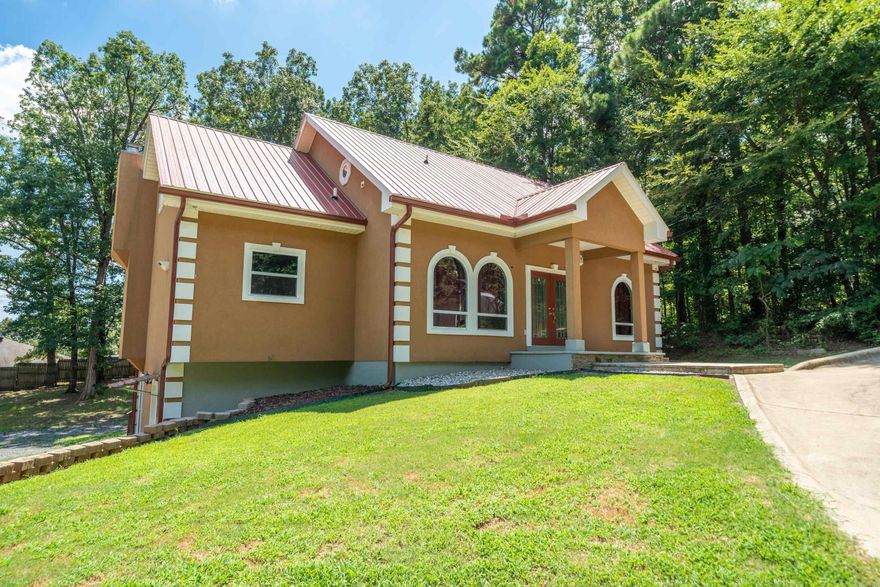 Discover this completely remodeled home offering the perfect solution for multi-generational living or savvy investors seeking dual income potential. This impressive 5-bedroom, 4-bathroom home spans 3,615 square feet and cleverly features two separate living spaces that could make even the most territorial in-laws smile with appreciation. The downstairs living area comes equipped with its own full kitchen, creating an ideal setup for two families to coexist harmoniously without disputes over refrigerator real estate. Whether you're housing college kids, aging parents, or running a rental operation, this flexible floor plan adapts to your lifestyle needs. Fresh renovations including crown molding throughout ensure modern comfort and style, while the generous square footage provides ample room for everyone to spread out. The thoughtful design maximizes both privacy and togetherness, making family gatherings enjoyable rather than overwhelming. This property represents a rare opportunity to own a versatile home that truly works as hard as you do.