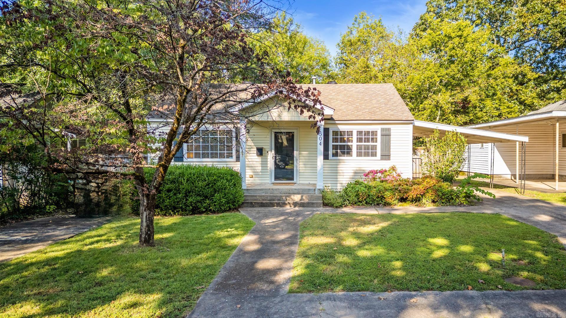 Charming 2-Bedroom, 2-Bath Home with Modern Updates & Spacious Backyard Step into this adorable, fully remodeled home, featuring updates that bring peace of mind and modern comfort! Renovated in 2008, the home boasts new wiring, plumbing, roof, central HVAC, energy-efficient windows, and a new water heater. Enjoy the outdoors on the newly added deck, perfect for relaxing or entertaining, while the 6-foot privacy fence encloses a large backyard with no rear neighbors for added serenity. Within walking distance of Shopping, Restaurants and Medical Corridor. Additional highlights include floodlights, gutters, and covered parking with an extra parking pad for convenience. Located within walking distance of shops and restaurants, this home offers both charm and practicality. Don't miss out on this move-in-ready gem! Agents, SEE REMARKS