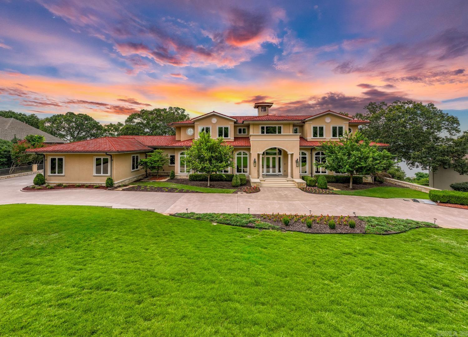 Spectacular home for the ultimate in family living and entertaining in Little Rock! Panoramic river views and impeccable quality construction offers unsurpassed atmosphere! Stunning living room with soaring two story ceiling and wall of windows with expansive views. Custom designed gourmet kitchen with breakfast. Elegant banquet formal dining. Luxurious spa inspired master suite w/ his and her baths on the main level. Four additional large bedroom suites up. Lower-level: Spacious game room, den, kitchenette and exercise w/ storage. 4 car garage. Gorgeous estate lot with exceptional outdoor living, stunning pool, sports court etc! Please call for additional details.