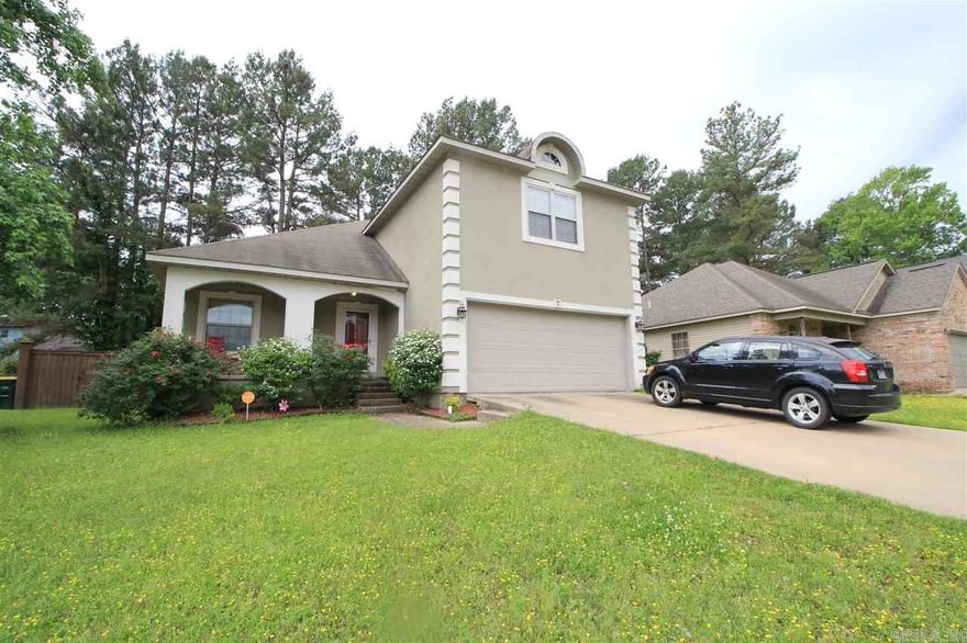 Remarkable move in ready home on quiet cul de sac!  Walk into soaring ceilings and nice sized living space with beautiful hardwoods.  Eat in Kitchen with lots of cabinet space and access to private backyard.  Master suite on the main level with walk in closet and bathroom with Jacuzzi tub and walk in shower.  Upstairs you will find two additional bedrooms and another full bath.  Tons of storage, Security system, two car garage.