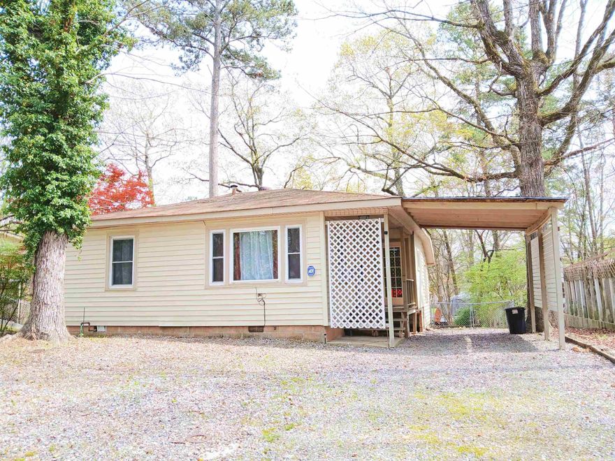 This is a quaint little home set close to Lake Hamilton nestled in a quiet cozy neighborhood. This home has the feel of a cozy cottage with the old style look with modern conveniences. This home would be a great starter home or rental property. Solid home in a great convenient location but outside city limits away from the hustle and bustle! Cute home with a great feel at an affordable price!