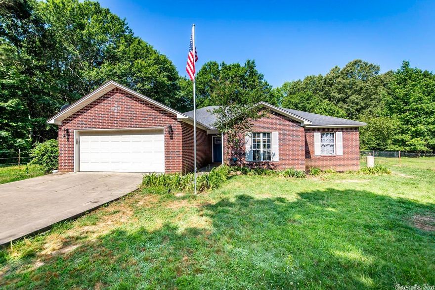 This remarkable 3 bed, 2 bath property is situated on a sprawling 5.11-acre lot, offering ample space for your desired lifestyle. As you step inside, the family room welcomes you with its cozy fireplace. The kitchen has been thoughtfully updated, featuring elegant quartz countertops, a stylish tile backsplash, and a large walk-in pantry. Primary room boasts his-and-her closets, providing plenty of storage space, updated countertops, shower and corner tub. Step outside and discover a true oasis. An inviting inground pool is perfect for entertaining and overlooks the stocked pond.  Property is perfect for livestock with 4 stall Barn and chicken coop.  Large shop w/ electric, 2 RV covers, firepit and picnic area. Also, RV hookups on side of house.  Welcome to your Dream Home! See Agent Remarks.