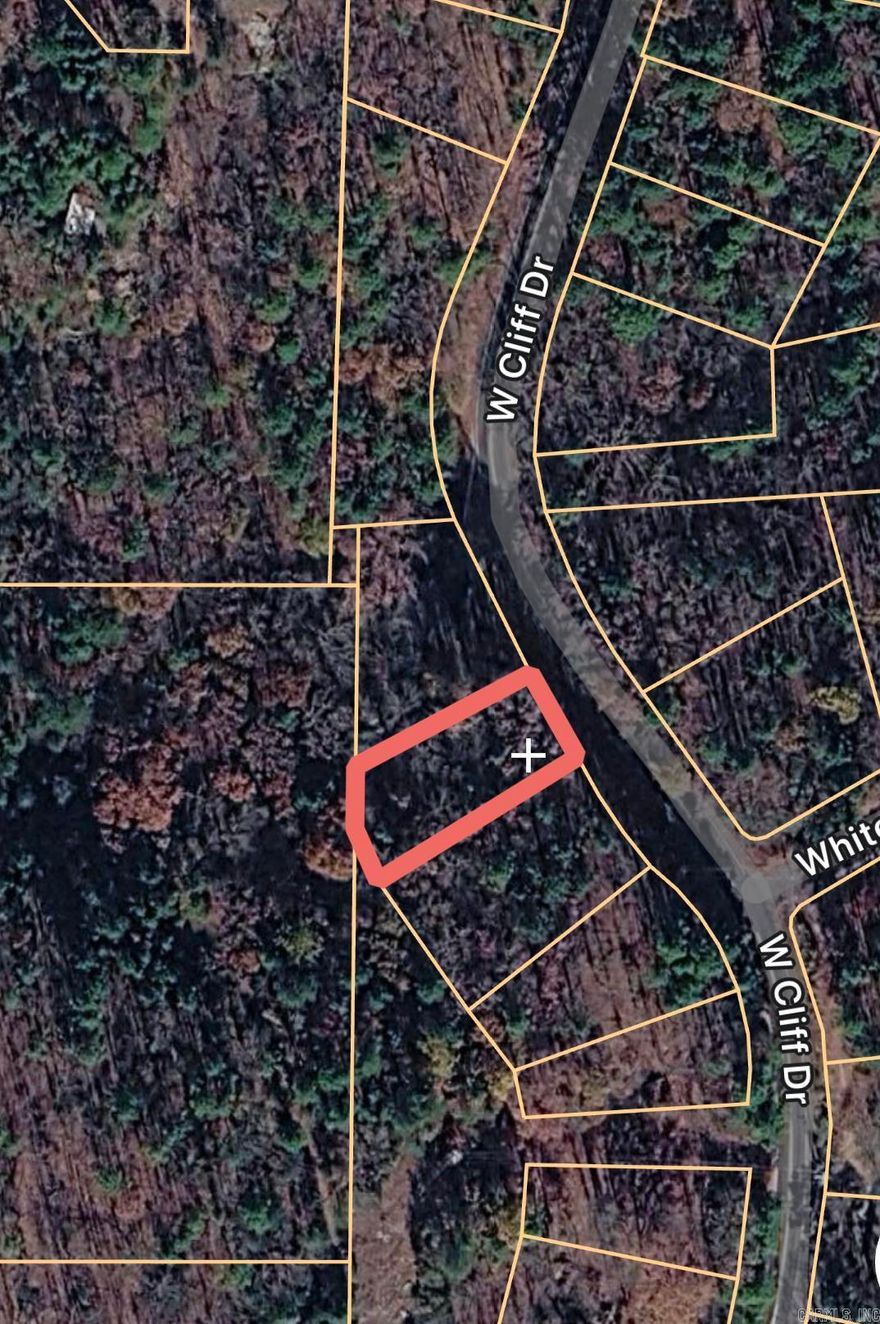 Build your dream home on this 0.22-acre lot located in the Lakeview subdivision of Fairfield Bay. This residential vacant land offers a sloped setting with paved road frontage along Cliff West Dr, providing a great opportunity for a custom build. Utilities are available nearby, and the property offers convenient access to Greers Ferry Lake, golf courses, trails, and other recreational amenities. Ideal for a primary residence, second home, or investment property.