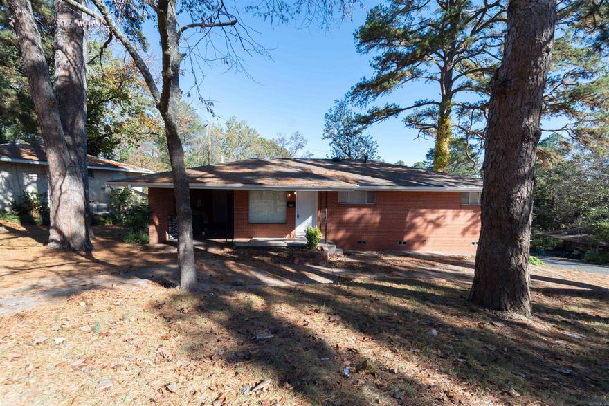Charming 3-bed / 2-bath brick home offering 1,360 sq ft of functional living space with a spacious floorplan. Additionally there is a utility room that can be used as an enterance through the carport. This home offers an updated, but easy to maintain interior and close proximity to UALR and UAMS, making it ideal for investors, staff, or students seeking convenient access to campus and medical centers. Property has recently rented at $1,200/month with room to increase.