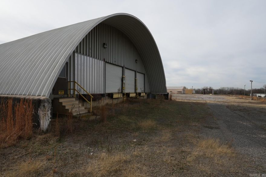 Prime commercial opportunity on approximately 4.8 acres with an existing building just one minute from I-40 and Russellville commercial. Zoned C-2 and C-5, this versatile property can accommodate a wide range of business uses—ideal for industrial, retail, service, or mixed-use development. The site offers excellent access and visibility along Bradley Cove Rd, with utilities on site and ample room for expansion or additional structures. Whether you’re an owner-operator seeking functional facilities or an investor looking for a high-growth corridor near businesses and major highways, this property delivers location, flexibility, and long-term potential.