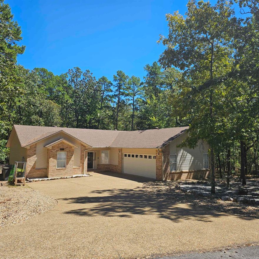 "Home is where the heart is," and this residence checks all the boxes. Set in a beautiful, private yet not so isolated location, it's conveniently near shopping and at a comfortable distance. The level, low-maintenance yard is embraced by nature's beauty. An open floor plan creates the illusion of extra square footage due to minimal hallways. The great room boasts vaulted ceilings and ample light, with sliding doors leading to an expansive, partially covered deck, descending to a large, fenced-in yard. Three well-separated bedrooms ensure privacy between the primary and guest rooms. Culinary enthusiasts will appreciate the generous cabinetry and pantry space. The kitchen provides easy access to the dining area. With a low-upkeep vinyl brick exterior and durable wood and tile floors, it requires minimal maintenance. The home encompasses approximately 1804 square feet of heated and cooled space, including a sunroom adjoining the primary bedroom. A utility room with built-in cabinets is conveniently located off the kitchen. All this is available for $285,000. A MUST TO SEE!