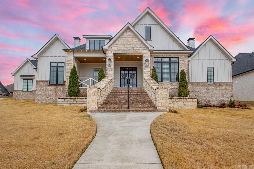 MUST SEE! Builder's custom home with high end features only 2 years old! All 3 bedrooms are on the main level & all have a full bath. The comfortable game room upstairs has privately zoned heat/air. Impressive curb appeal on a corner lot, stone exterior & twin iron entry doors. As you enter the home you find a beautiful & functional office. Throughout the home tall ceilings, waterproof LVP & custom built-in cabinetry. Home includes many unexpected custom features: Plantation shutters, wood accent ceilings & stone fireplace. The kitchen WOWS w/professional double convection ovens, built-in convection microwave & undercounter sonic icemaker. Enjoy entertaining at the 5x10' island w/veggie sink & quartz countertop even inside the walk-in pantry! Cooking is a breeze on the 5 burner cook-top w/pot-filler faucet above. Enjoy beautiful backyard view from windows over main kitchen sink, (porcelain farm style). Additional features: Sprinkler system, Zoysia grass, Pella windows, fenced backyard, extra concrete drive & tankless water heater. Step out the twin iron back doors onto the large LEVEL covered patio to enjoy a wood burning fireplace.  A one of a kind property! Schedule today!