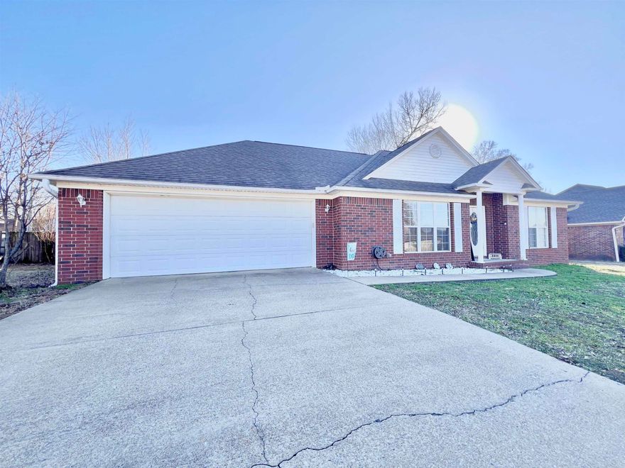 Welcome to this lovely home in the desirable Valley Elms Subdivision. It has 3 bedrooms and 2 baths with a very spacious floor plan. The living room is generously sized with tray ceilings and a cozy fireplace. The kitchen provides plenty of cabinetry and countertop space along with beautiful wood floors that flow into the dining area that also has French door access to the back yard. As you go into the master bedroom, you'll notice the beautifully lit double tray ceiling that provides a lovely ambiance to the room. You also have your private access to the back porch. The en-suite offers a private shower and separate corner whirlpool tub. The closet has ample storage and space. You'll find the other 2 bedrooms and bath conveniently located on the other side of the home. Additional updates include New HVAC 2022 and new roof 2013. All of this sits on a spacious .29 acres with a fenced in back yard that includes a storage shed.