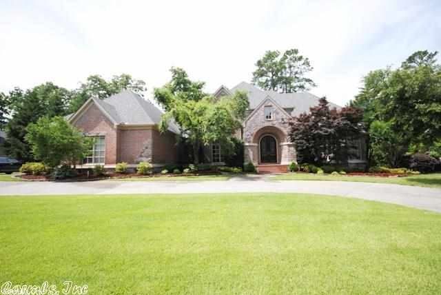 This distinguished and highly impressive manor house was custom built by Kevin Hughes, for his personal home.  Features include a grand foyer, impressive formal living room, formal dining room, custom kitchen, informal dining area and cozy den. The owner’s suite features a tray ceiling and large master bath and closet. Also on the main level, is a wonderful library/study with built-in’s.   Upstairs you will find three bedrooms each with a bath and a media room.  The grounds are beautifully landscaped.