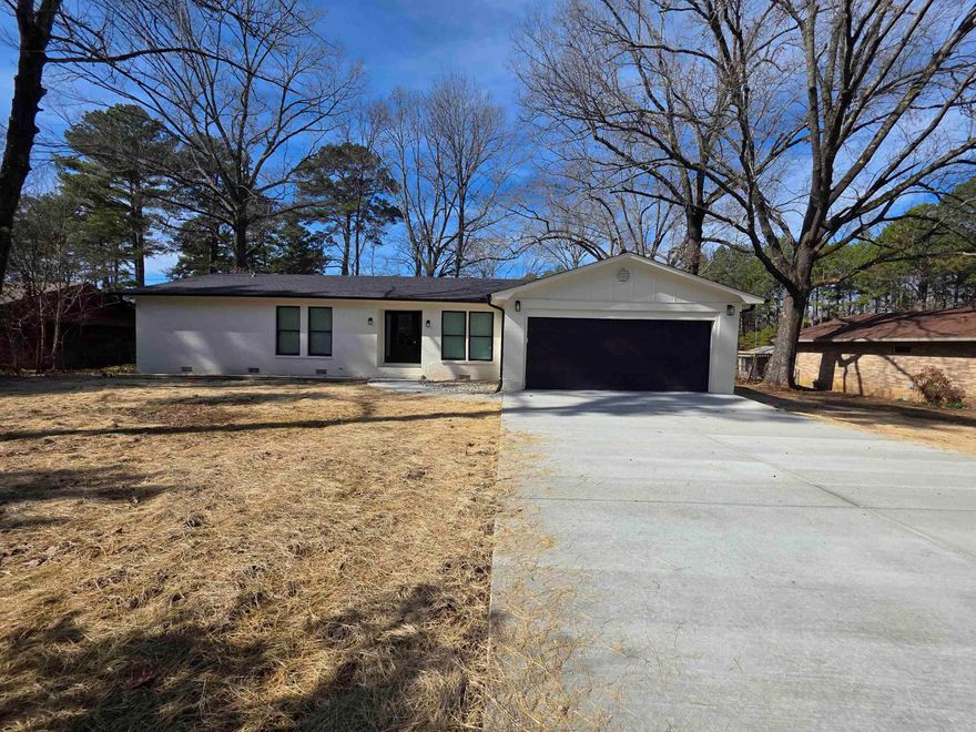 Add Luxury to your Home Search! Experience refined comfort in this beautifully updated 3-bedroom, 2-bath residence located in the desirable Alexander area. Designed with both style and functionality in mind, this home offers a seamless open-concept layout complemented by a dedicated dining space — perfect for elevated everyday living and effortless entertaining. The living area is anchored by a cozy fireplace, creating a warm and inviting ambiance. The kitchen features sleek granite countertops, generous cabinetry, and elegant gold finishes that add a sophisticated touch throughout the space. The spacious primary and secondary bedrooms provide ample closet storage, while a private laundry room adds convenience and organization. Step outside to enjoy a spacious backyard — ideal for relaxing evenings or weekend gatherings. Perfectly positioned near shopping, dining, and major highway access, this residence offers both comfort and connectivity.