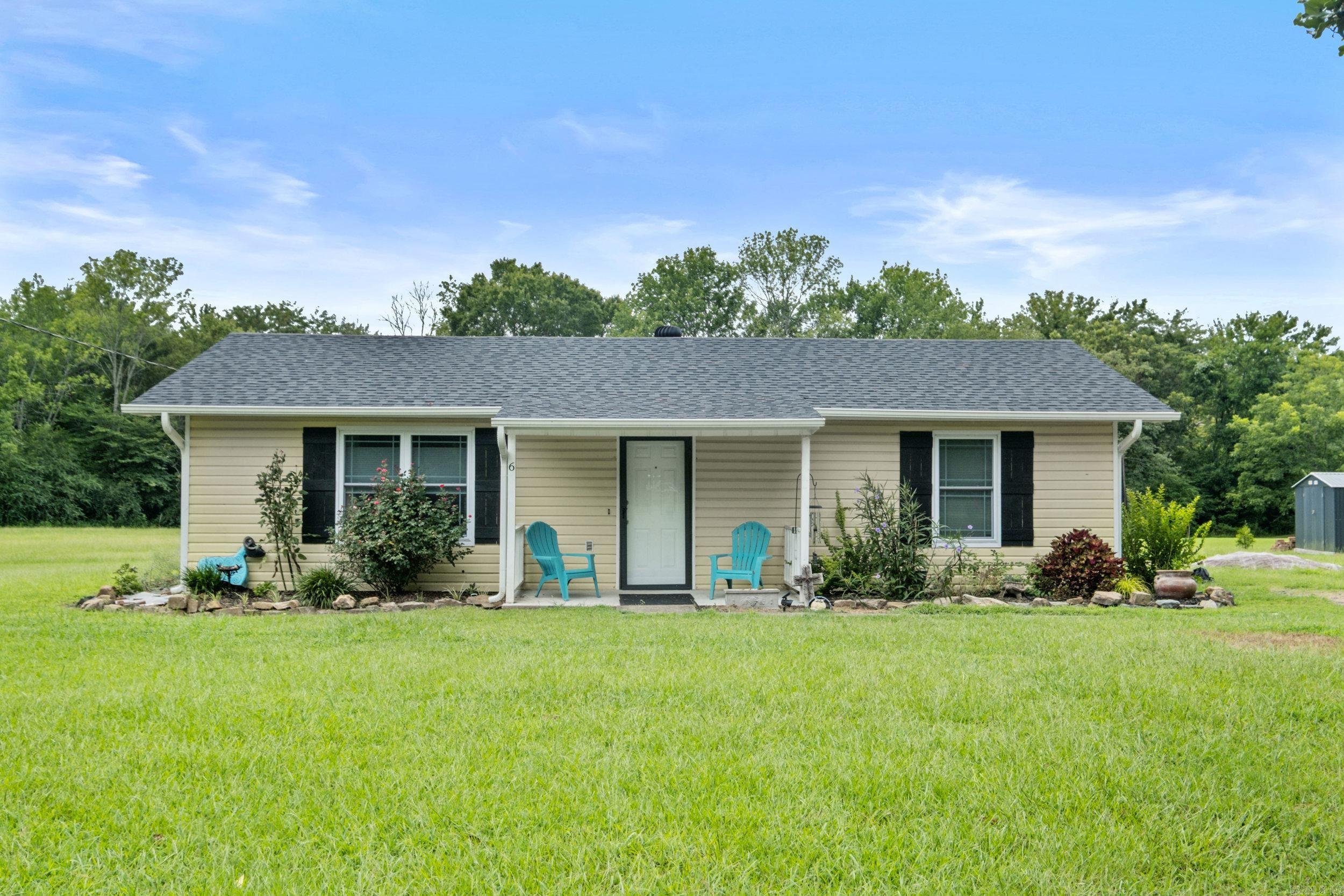 This charming well-maintained 2 bedroom, 1 bathroom home sits on 1.5 peaceful acres just minutes from downtown Conway. Thoughtfully updated with major improvements, including a new roof (2022), new HVAC (2016), new windows (2025), and a fresh interior repaint (2025), New light fixtures (2025) Entergy's Grant program- New Insulation (2025) Enjoy modern convenience with a new stove and dishwasher (2025), washer/dryer - conveys (2023), and an upsized 30-gallon water heater (2024). Outdoor features include a new storage building (2023), greenhouse (2024), extended patio (2025), and new gutters (2023)—perfect for gardening, entertaining, or relaxing in your own space. Move-in ready with plenty of updates already done—don’t miss this rare find with room to grow!