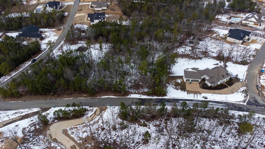 This spacious lot, located at the end of a quiet cul-de-sac, offers plenty of room for your dream home. Situated in the desirable Meadows subdivision, it provides privacy and tranquility while still being close to amenities. The lot’s generous size makes it a perfect choice for those looking for more space and a peaceful setting.