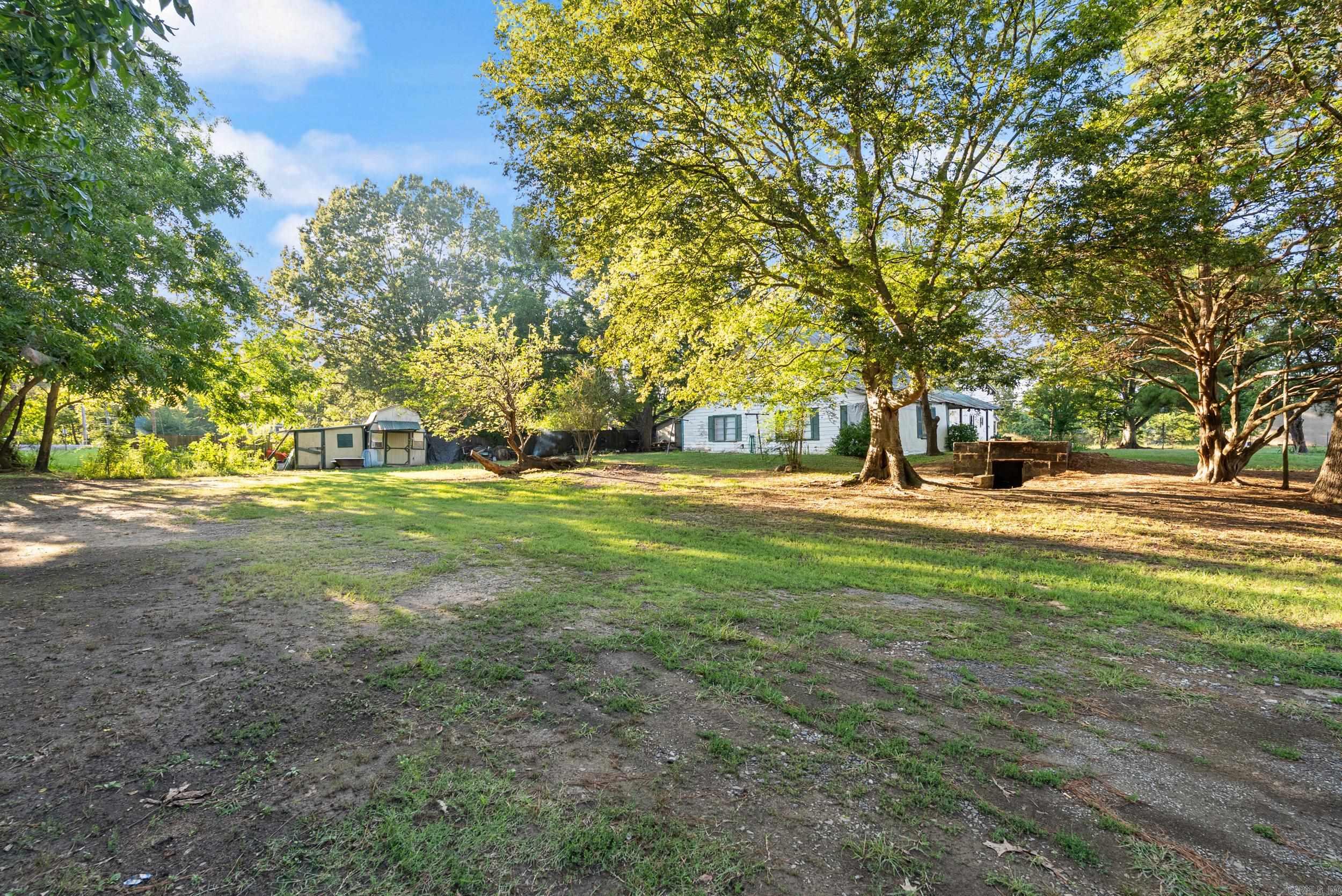 Spacious multi-lot property in the heart of Mayflower, offering an excellent opportunity for investors, builders, or those looking for future development potential. This parcel includes several adjoining city lots, providing ample space and flexibility for a variety of uses. Currently zoned residential, the property may present possibilities for duplexes, townhomes, or other multi-family housing with city approval. The City of Mayflower has shown openness to rezoning similar areas, though buyers should verify all plans with the city and planning commission. The property includes an existing home and additional outbuildings which will convey at no value. The home is currently occupied, but due to its age and condition, the property is being sold strictly as is. Please note: one small storage shed with a lean-to does NOT convey. Bring your vision and explore the potential of this property in a growing community! Agents: See private remarks