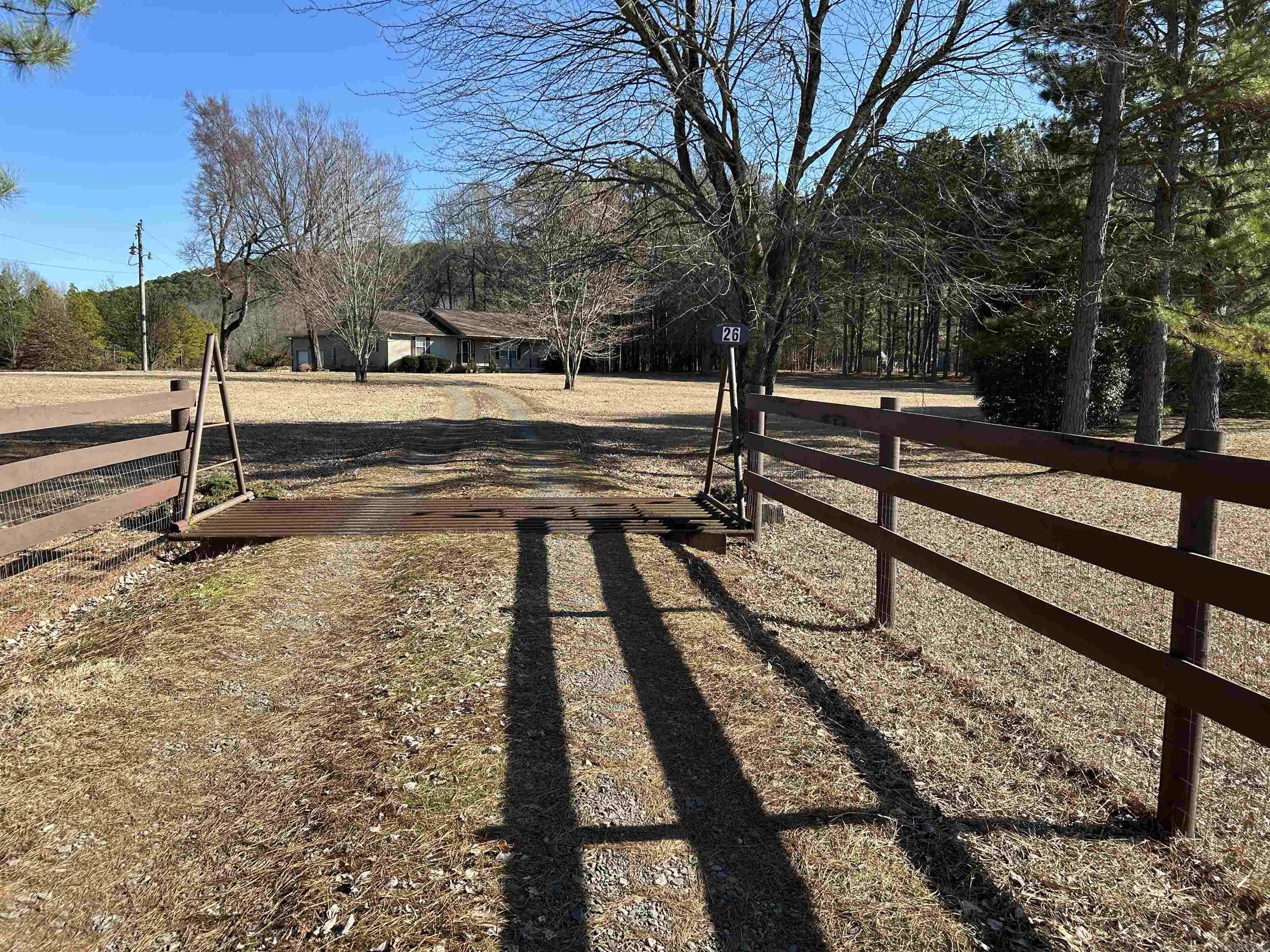 Here is a real gem!! Move in ready!! This house has been taken care of and it shows!! Update however you want! Peaceful country living with existing gardens, space for children, pets and a few chickens to run around on this 2.7 acres! Large established trees for needed shade in the summer and open areas to create your own landscaping. Lovely front porch to soak in the sun or relax after a hard day at work! Dead end road. Completely fenced with cattle guard at end of driveway. 2 sheds, garden beds, and annual flowers planted throughout! Newer shingled roof (approx 8 years old), luxury vinyl flooring, AC and furnace (Rheem, 2015), large bedrooms with large closets. Refrigerator and dishwasher (black) which were never put in house because previous sellers left existing, are included. Kitchen refrigerator and chest freezer will not convey, however. Vinyl siding, block foundation, smaller back deck, and spacious double car garage with extra side concrete parking. Public water. Private septic. Above electric. Fiber optic. Make this home yours as it won't last long! 30 minutes from Conway, 50 minutes from Little Rock. 10 minutes from Perryville. See additional agent remarks.